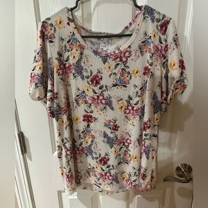 Naif floral print blouse with ruffle sleeves. Size Large